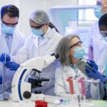 Logistics and lab team in tight lab
